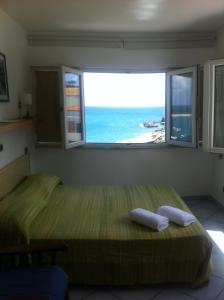 Postel nebo postele na pokoji v ubytování Excelsior Mare Suite
