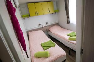 Posteľ alebo postele v izbe v ubytovaní Mobile Home
