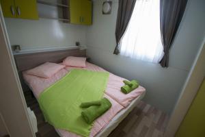 Posteľ alebo postele v izbe v ubytovaní Mobile Home