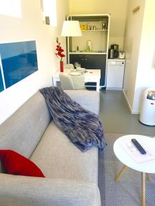 Kuchyň nebo kuchyňský kout v ubytování HAUS DOHRMANN - mit direktem Strandzugang,moderne, ruhig gelegene Ferienwohnungen mit Terrasse + 17 fotografií