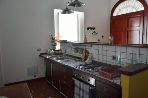Kuhinja oz. manjša kuhinja v nastanitvi Il Giardino del Sole