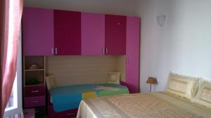 A bed or beds in a room at Sansone