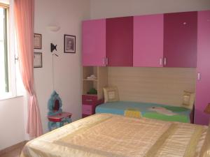 A bed or beds in a room at Sansone
