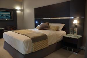 Uma cama ou camas num quarto em Hotel 2001
