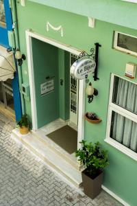 a front door of a house with a sign on it at Le Bijou Luxury Rooms & Suites in Veria +54 photos