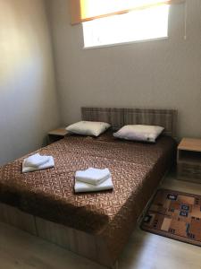 Postel nebo postele na pokoji v ubytování Galian Hotel