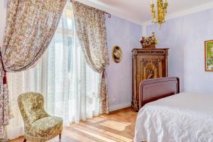 Postel nebo postele na pokoji v ubytování Le Stanze di Ebe