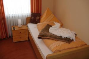 Postel nebo postele na pokoji v ubytování Hotel Mietz