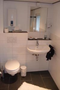 Koupelna v ubytování Hotel Mietz