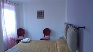 Voodi või voodid majutusasutuse Hotel Paese Corvara toas