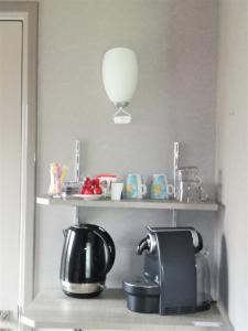 Kuchyň nebo kuchyňský kout v ubytování B&B De Ark