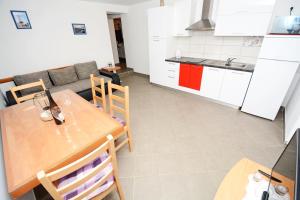 Kuchyň nebo kuchyňský kout v ubytování Apartments Katarina