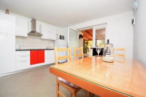 Kuchyň nebo kuchyňský kout v ubytování Apartments Katarina