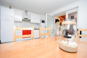 Kuchyň nebo kuchyňský kout v ubytování Apartments Katarina