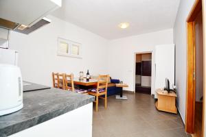 Kuchyň nebo kuchyňský kout v ubytování Apartments Katarina
