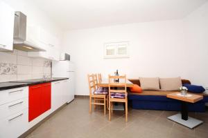 Kuchyň nebo kuchyňský kout v ubytování Apartments Katarina
