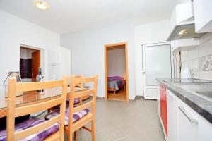 Kuchyň nebo kuchyňský kout v ubytování Apartments Katarina