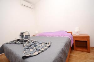 Postel nebo postele na pokoji v ubytování Apartments Katarina