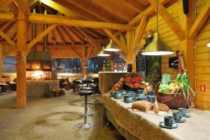 a large room with a table with food on it at Hotel Vivaldi in Karpacz
