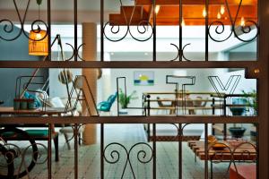 a dining room with a dining table and a dining room at The Salty Lodge in Lagos