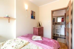 Postel nebo postele na pokoji v ubytování Blue Sky Apartment