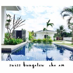 Kolam renang di atau dekat dengan Swiss Bungalow Cha Am