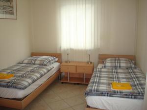 Katil atau katil-katil dalam bilik di Gästehaus Sol Tour