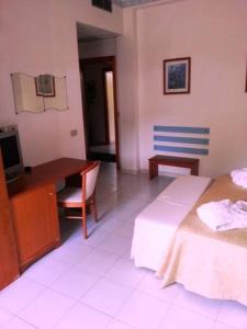 Postel nebo postele na pokoji v ubytování Villa Dei Principi Hotel