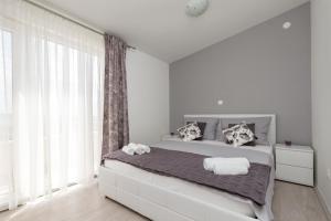 Posteľ alebo postele v izbe v ubytovaní Panorama Holidays