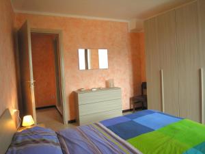 Cama ou camas em um quarto em Casa Gabriella