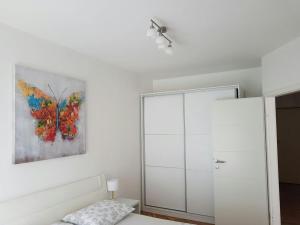 Ένα ή περισσότερα κρεβάτια σε δωμάτιο στο Apartment Bebulino