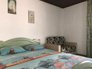Postel nebo postele na pokoji v ubytování Akvitaniya Mini-Hotel