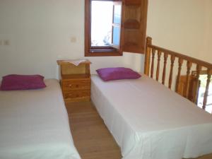 Postel nebo postele na pokoji v ubytování Patmos Garden Sea