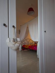 A bed or beds in a room at B&B Costa D'Abruzzo