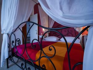 A bed or beds in a room at B&B Costa D'Abruzzo