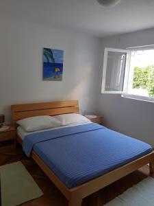 Ένα ή περισσότερα κρεβάτια σε δωμάτιο στο Apartment Ivka +55 φωτογραφίες