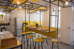 Kuchyň nebo kuchyňský kout v ubytování B&B L'Officina di Apollo
