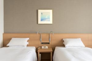 Katil atau katil-katil dalam bilik di Sapporo Park Hotel