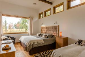 Cama ou camas em um quarto em Patagonia House