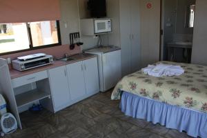 A kitchen or kitchenette at Bay View Holiday Village