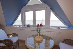 Χώρος καθιστικού στο Ferienwohnung Wiek - Haus Meeresblick