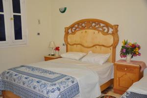 Villa Omar EL Sharif房間的床