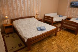 Postel nebo postele na pokoji v ubytování Amfora