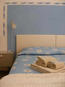 Posteľ alebo postele v izbe v ubytovaní Casa Palmira
