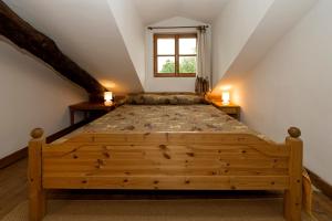 A bed or beds in a room at B&B Il Quadrifoglio
