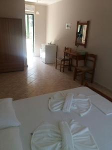 Postel nebo postele na pokoji v ubytování Santas Rooms
