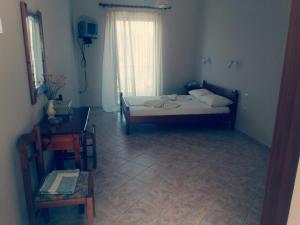 Postel nebo postele na pokoji v ubytování Santas Rooms