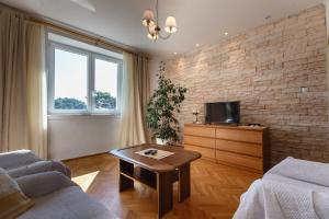 TV a/nebo společenská místnost v ubytování Apartments Maris