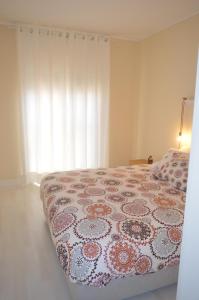 Giường trong phòng chung tại Tres Castelos