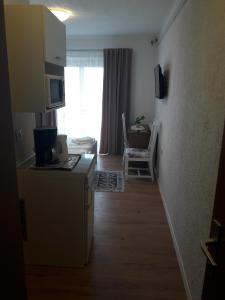 Kuchyň nebo kuchyňský kout v ubytování Roza Guest House